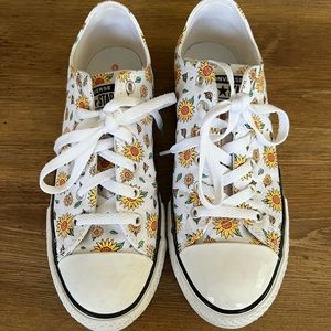 White Converse with sunflower print and a small platform. Big kid size 5